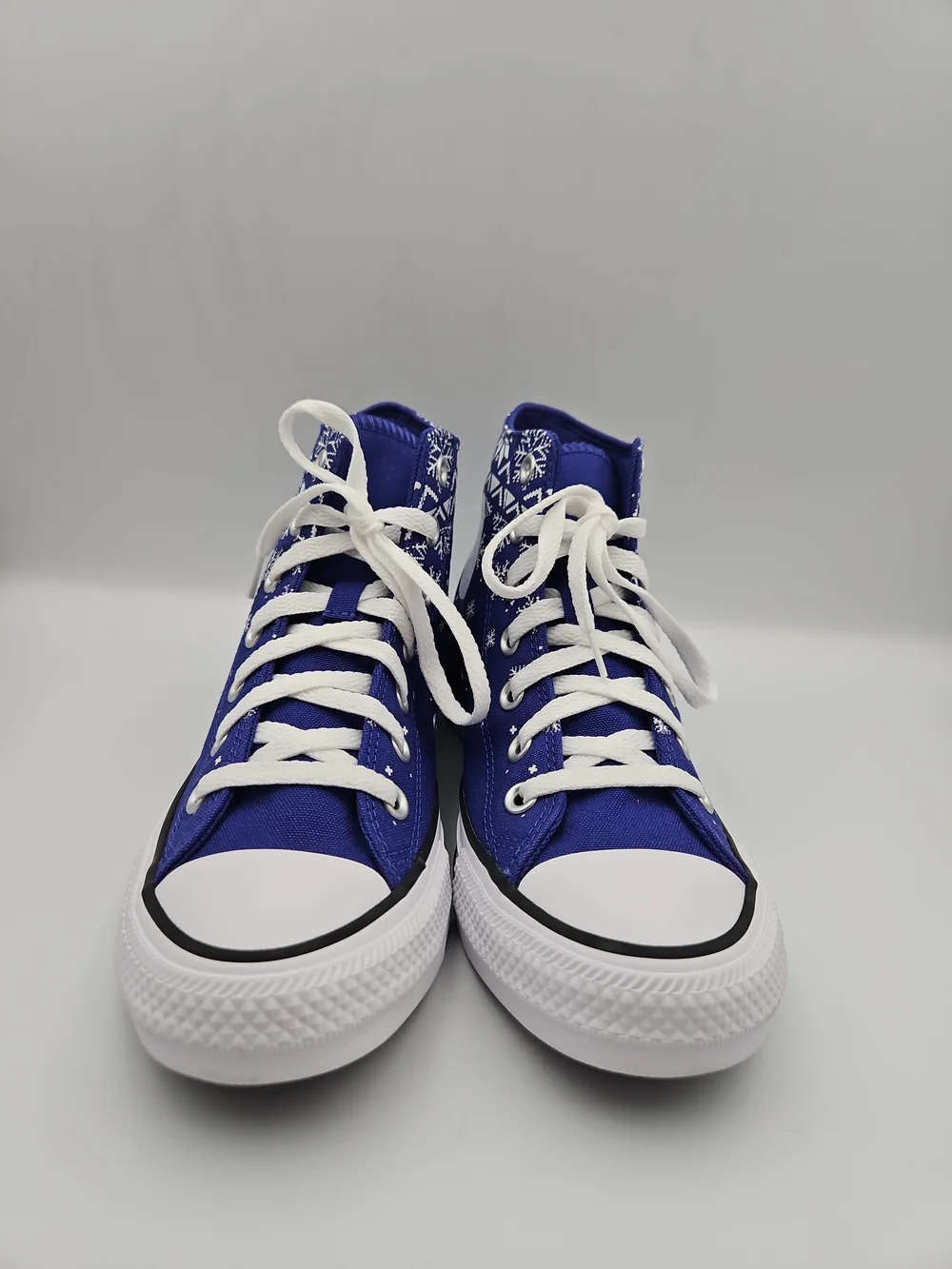 Converse High-Top Sneakers in Royal Blue with White Snowflake Print